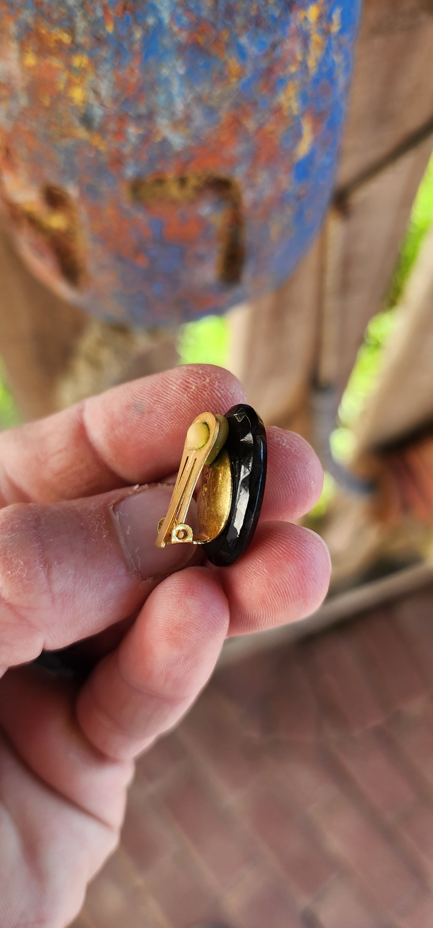 Beautiful and generous-sized pair of vintage clip-on earrings from the mid-20th century, when classical elegance saw a magnificent resurgence.