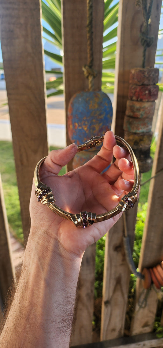 Glamour never goes out of style—and this vintage treasure is living proof! This rare circa 1945 designer choker necklace by Coro is a glorious throwback to the golden age of fashion, dripping in bold Art Deco flair with a touch of retro-futurism.