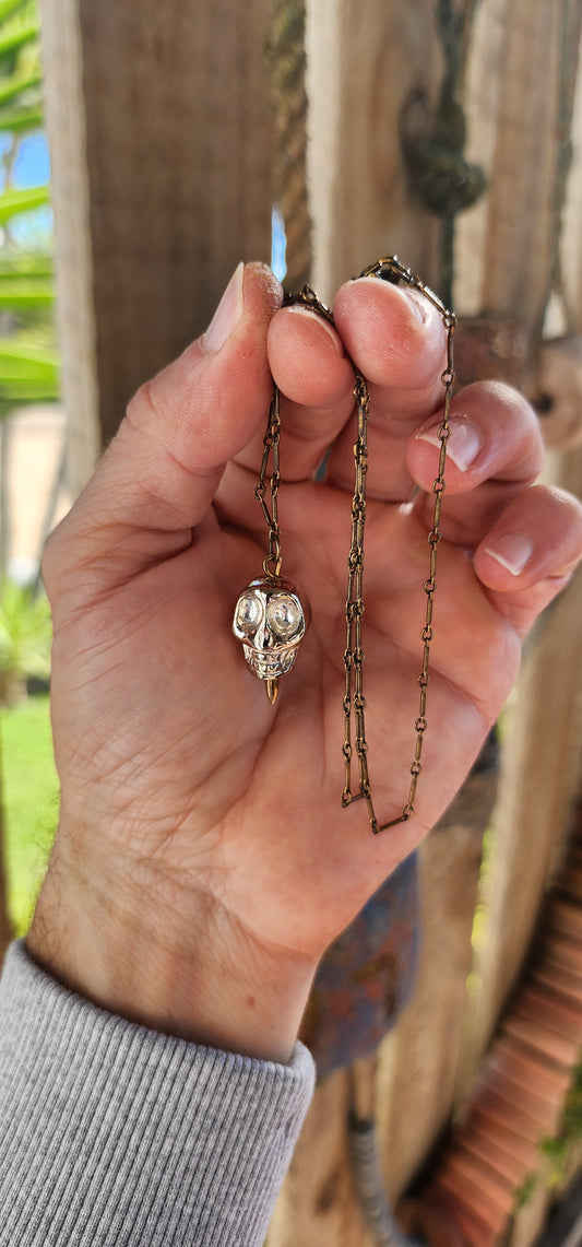 This rebellious little beauty is a designer costume necklace by none other than Pamela Love, the New York queen of mystical-meets-modern jewelry.