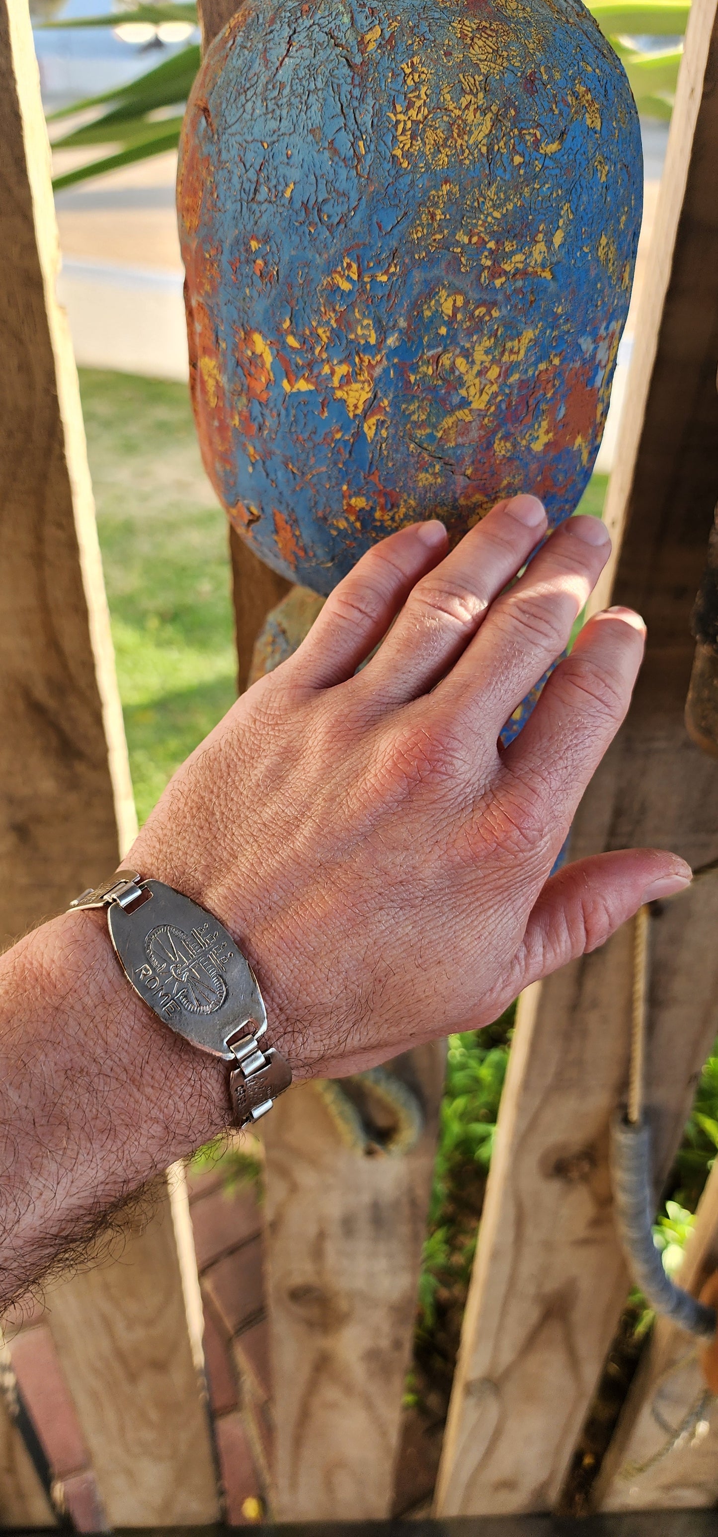 Jet-set glamour meets nostalgic charm in this vintage panel bracelet by iconic French jewelry house Gas Bijoux. This beauty is silver-plated and handcrafted in the distinctive style of WWII-era Italian souvenir bracelets.