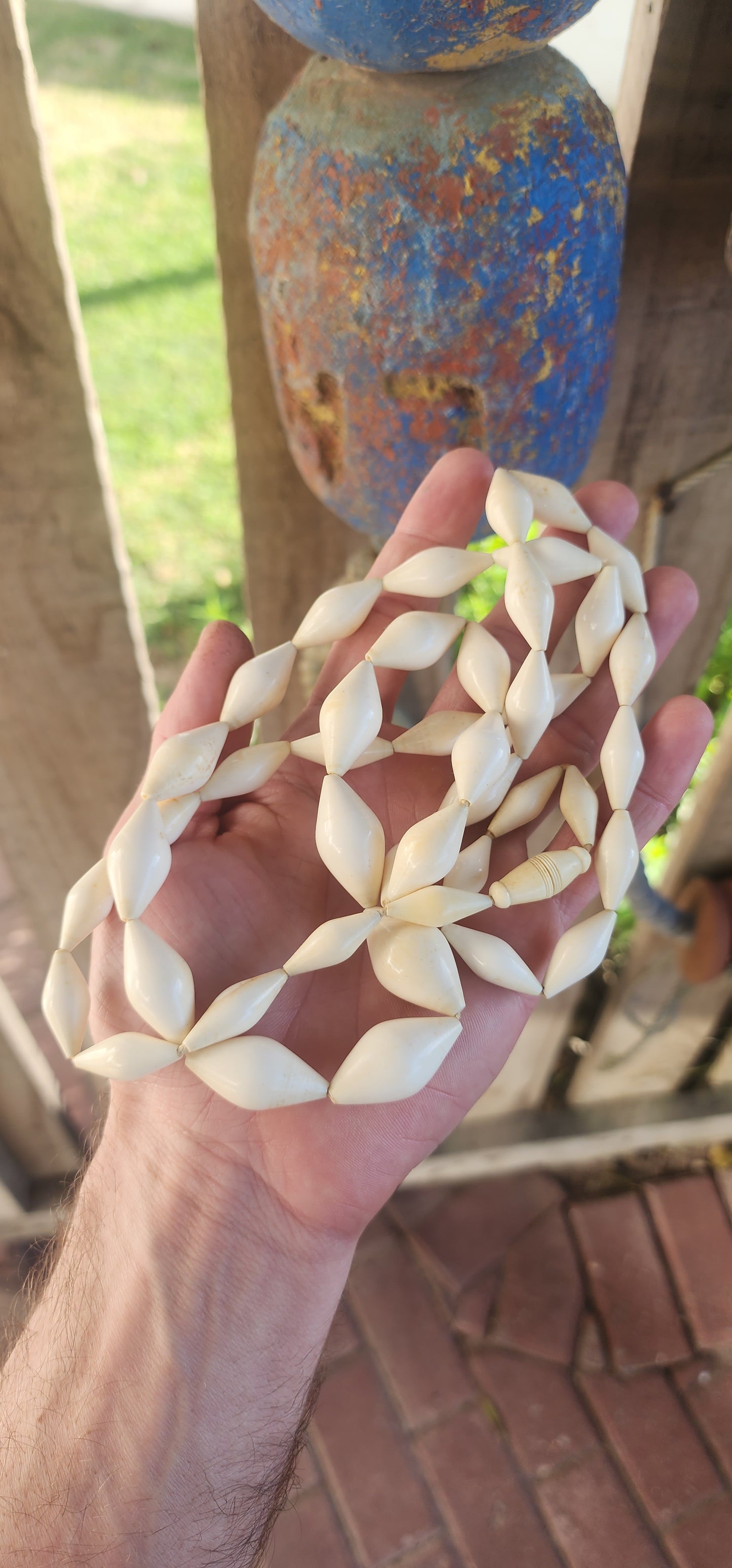 Extraordinary antique pre-ban ivory necklace—a true treasure carved by hand. This exquisite piece boasts a luxuriously extra length strand of marquise-shaped ivory beads, each one individually hand-carved with a soft, organic sheen that only time can best