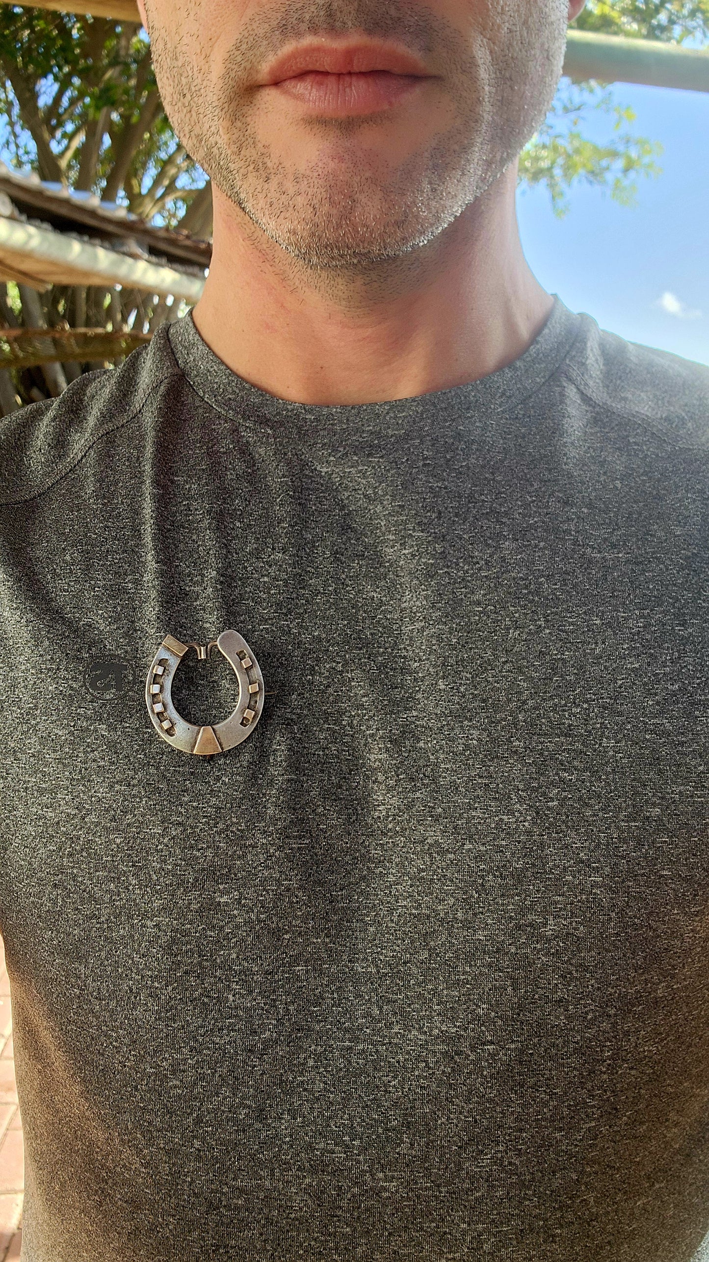 Rare and commanding Victorian era lucky horseshoe brooch, masterfully crafted in solid sterling silver and adorned with 9ct rose gold accents. Measuring large and weighty, this brooch doesn’t whisper luck—it proclaims it.