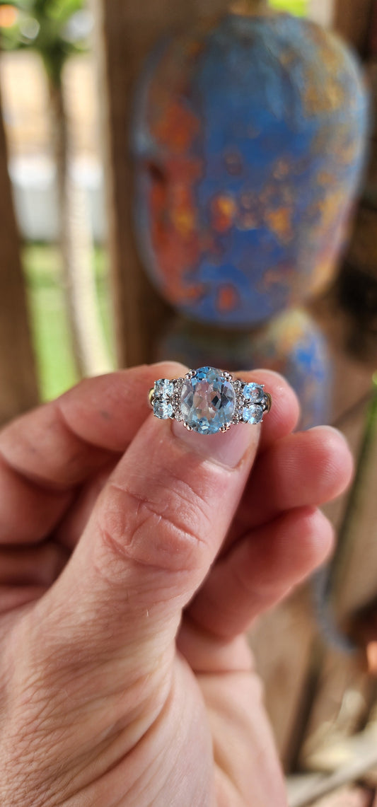 "Cloudlight Crown" – A Ring of Sky and Sparkle 
Like a breath of fresh air in jewelry form, this marvelous, rather chunky trilogy-style ring is expertly crafted in rhodium-plated sterling silver, ensuring it keeps its high-polish shine.