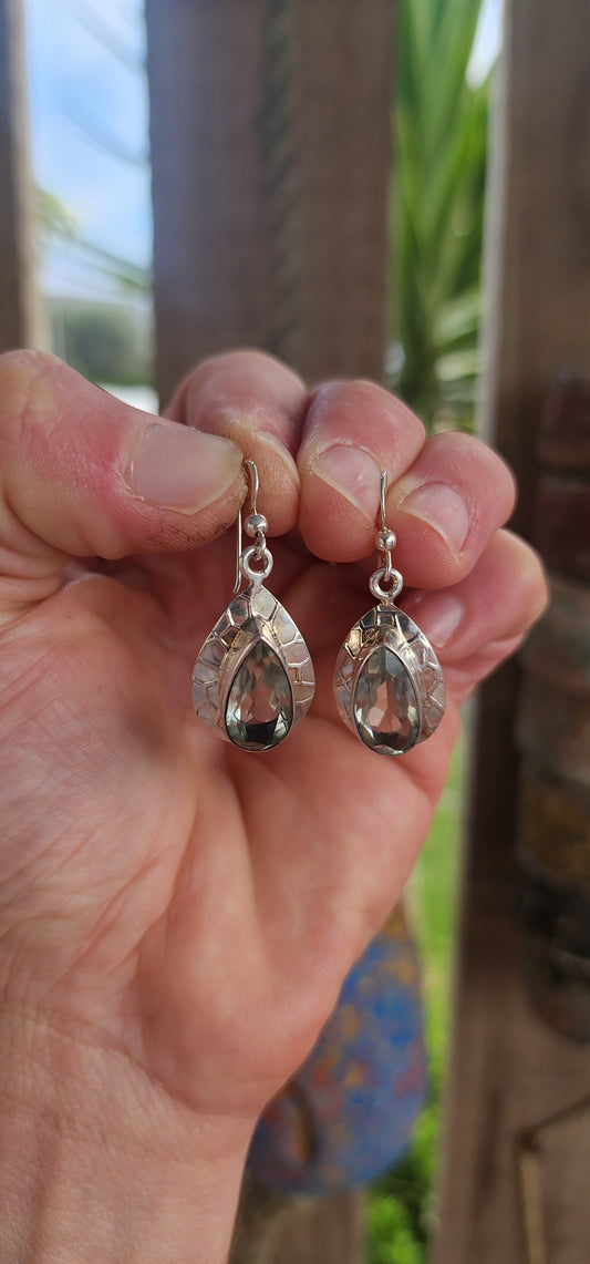 These artisan-crafted drop earrings are like little treasures from a jungle fairytale—bold, beautiful, and utterly untamed.