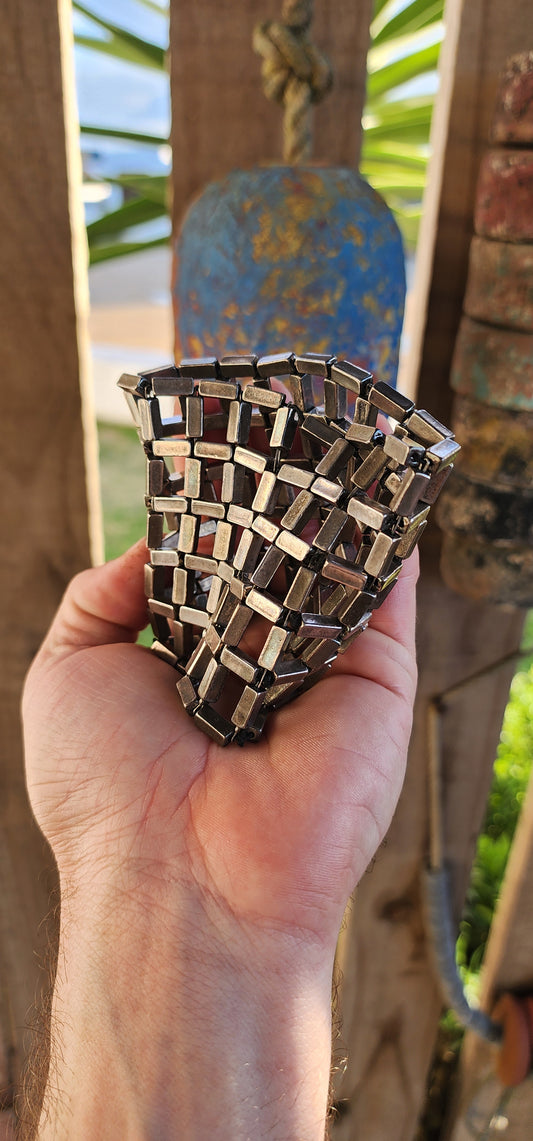 "Urban Jungle” – A Bold Cuff with Warrior Spirit .
Crafted with unapologetic flair, this vintage handmade costume bracelet serves up a serious dose of sculptural drama.