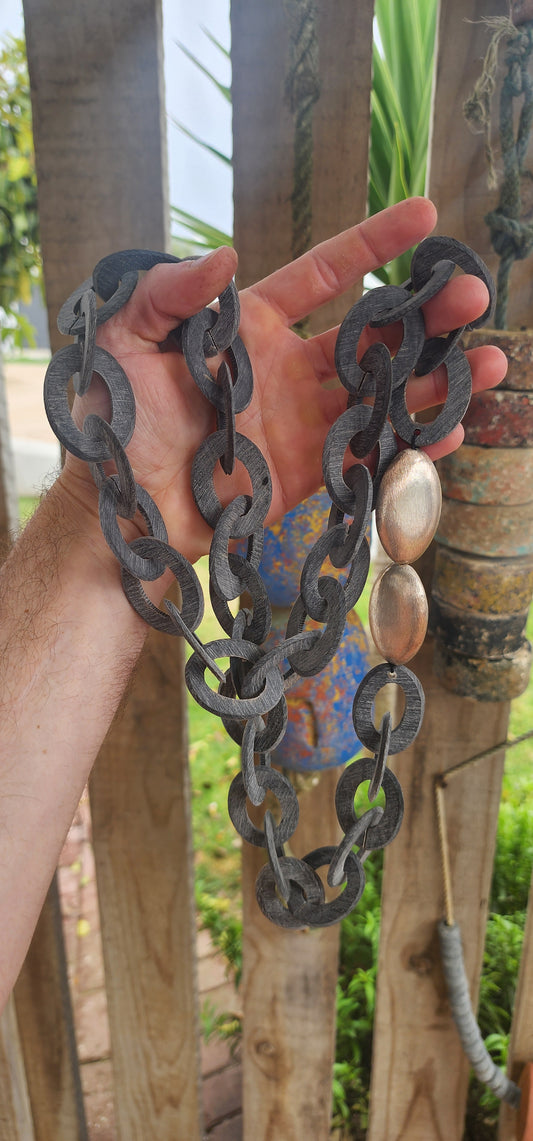 Summon your inner tribal warrior with this dramatic statement necklace carved from rich black buffalo horn.