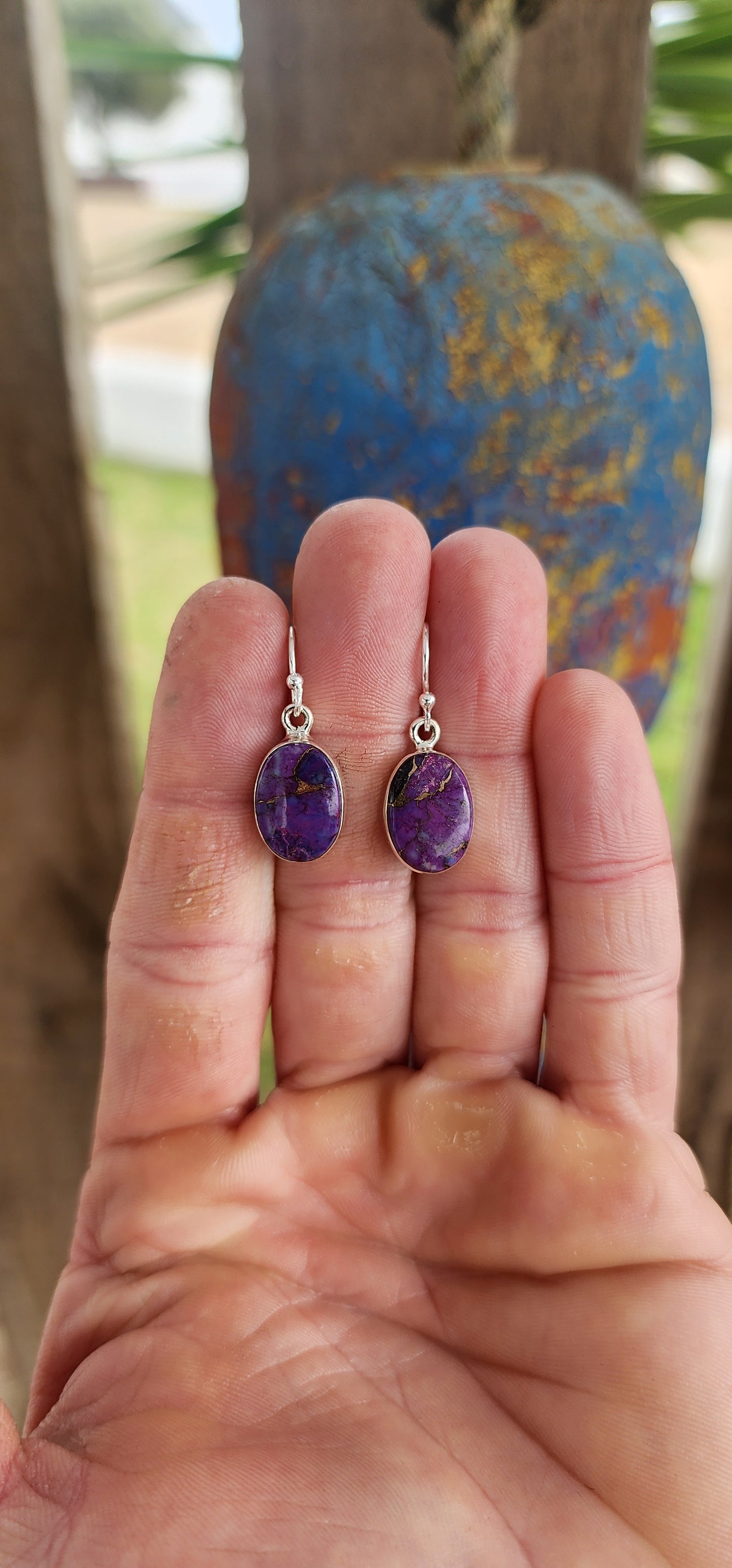 Minimalist? Yes. But boring? Never! These sterling silver dangle earrings are the definition of small but mighty magical.