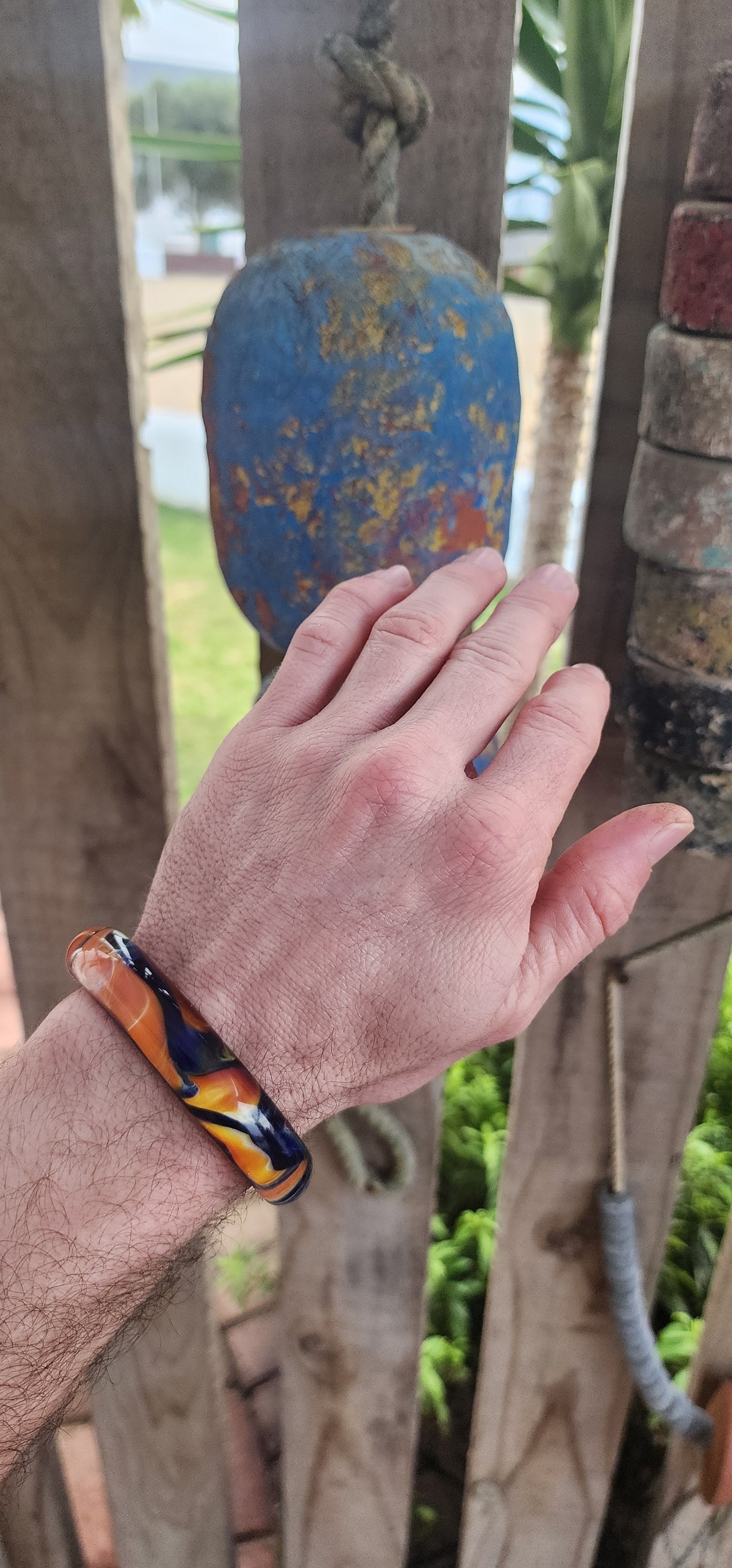Oh, hello there, statement-maker! 
This eye-catching cuff is not your average wrist candy — it’s a wearable slice of modern art.
