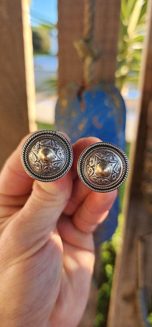 These marvelous and boldly styled earrings are a distinctive early creation by sought-after local jewelry designer Susan Roos. Crafted in solid sterling silver, these large push-in earrings make a powerful statement.