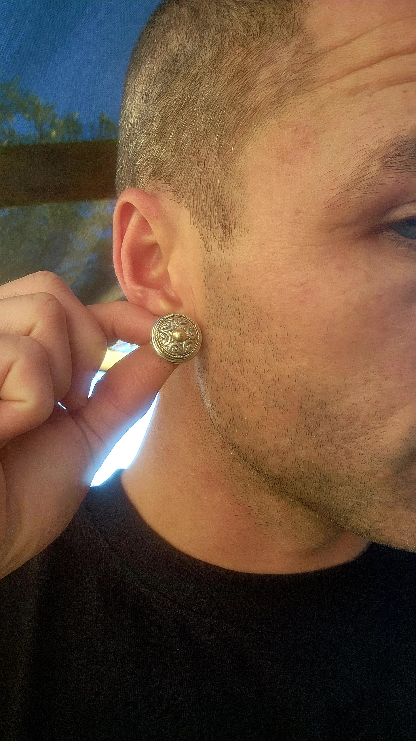 This impressive yet slightly more compact pair of early Susan Roos designer earrings perfectly embodies her bold yet refined style. Crafted in solid sterling silver, these push-in earrings present a commanding shield-like profile.