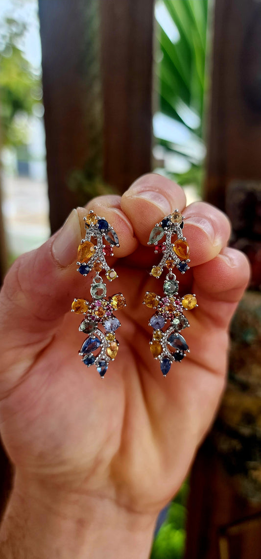 Behold these utterly enchanting drop earrings — a vibrant ode to nature’s poetry, woven in precious gemstones.