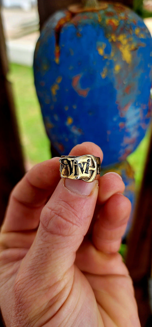 This striking designer ring is a creation of the legendary Vivienne Westwood, crafted in sterling silver with a lavish layer of gold plating. Evoking one of Westwood’s most beloved house codes, the ring takes the form of a sculpted belt with a buckle.