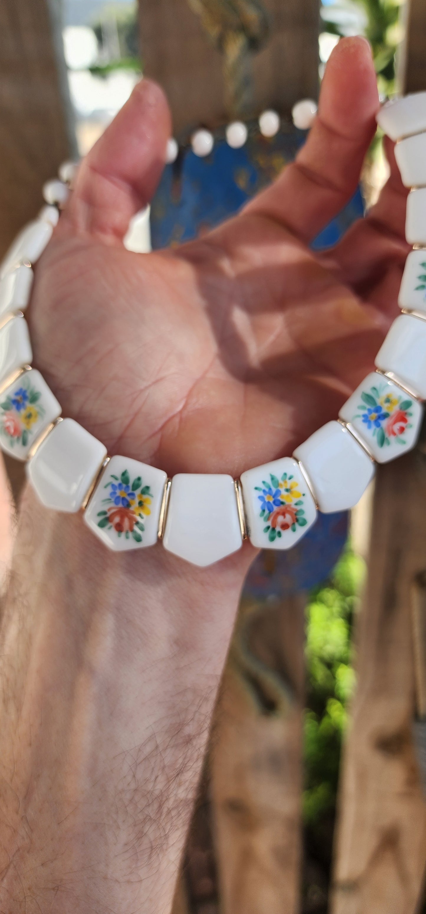 Vintage 1950s German Milk Glass Floral Panel Choker Necklace.
Crafted in West Germany during the 1950s, it showcases the highly prized milk glass — a luscious, opaque white glass popular from the Victorian era well into the mid-20th century.
