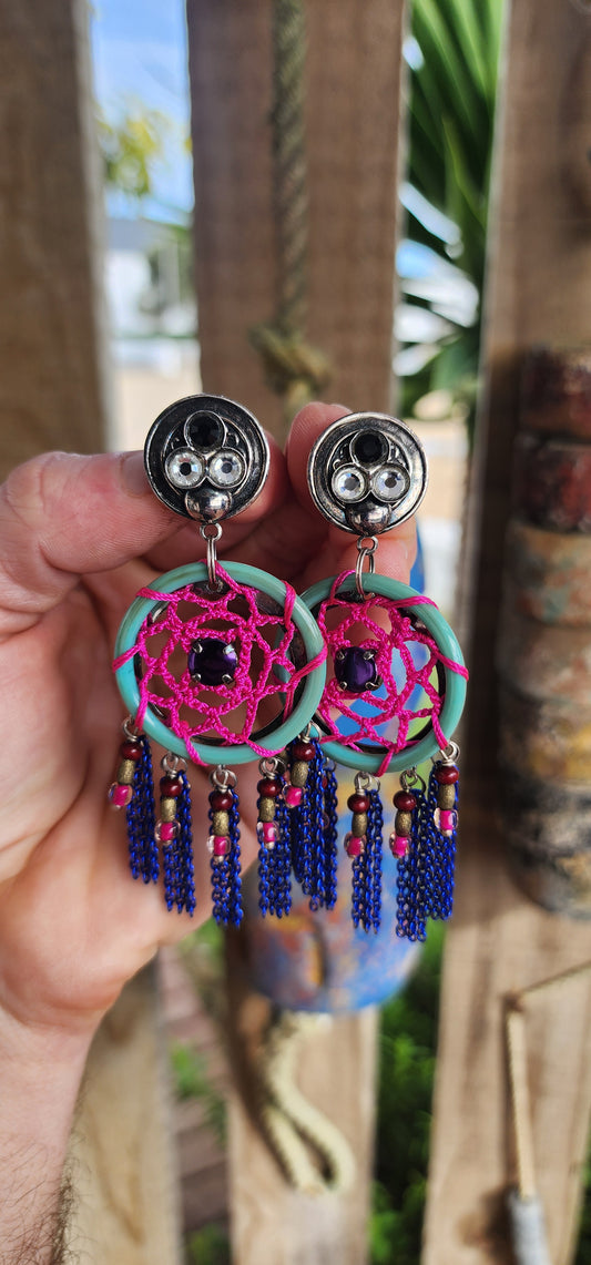Spectacular pair of costume statement earrings by Reminiscence, the renowned French fashion house known for blending haute couture artistry with exotic, boho-luxe flair.