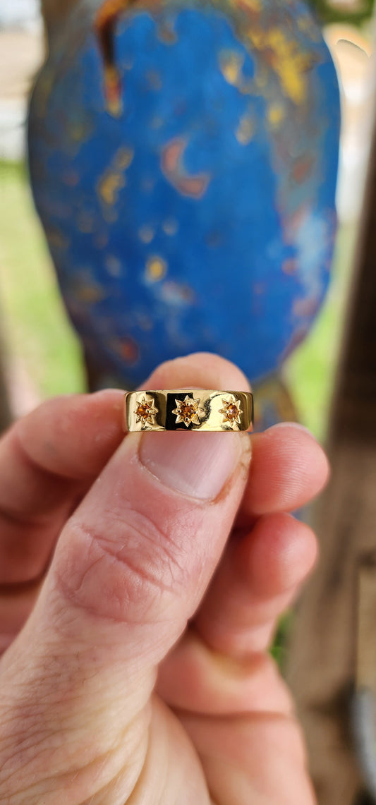 A Golden Gypsy Ring with Citrine Stardust.
Bold, luminous, and radiating warmth, this unisex gypsy ring is crafted from solid sterling silver and richly plated with glowing 18ct yellow gold.