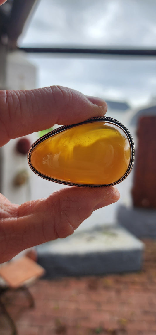 A Golden Drop of Prehistoric Sunshine – Vintage Sterling Silver & Egg Yolk Amber Brooch.