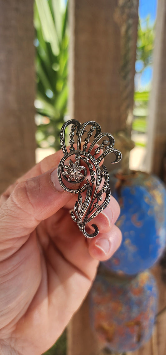 "Deco Bloom" – A 1930s Sterling Silver & Marcasite Floral Spray Brooch.