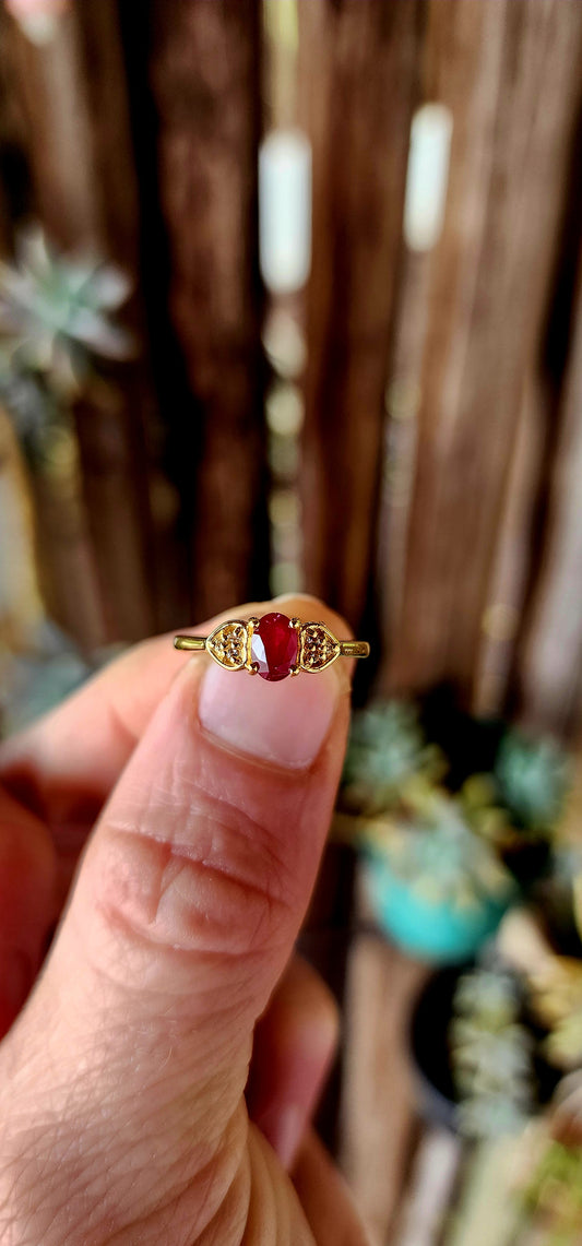 This enchanting trilogy-style ring is a delightful dance of elegance.
Crafted from sterling silver and generously plated with 18ct yellow gold.