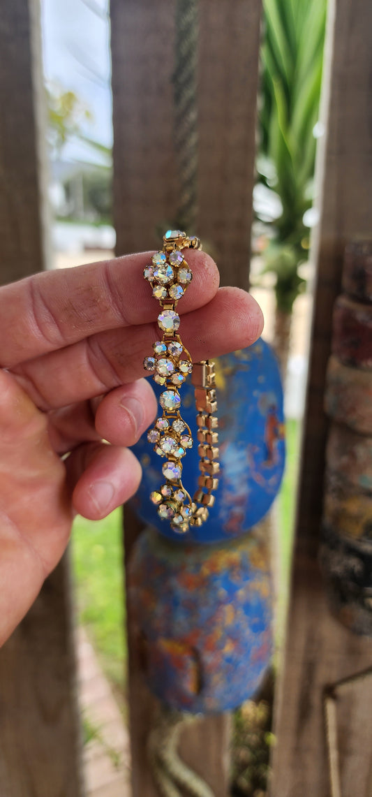 This glamorous vintage bracelet, dating back to the 1960s, is a true statement of mid-century costume jewelry elegance.