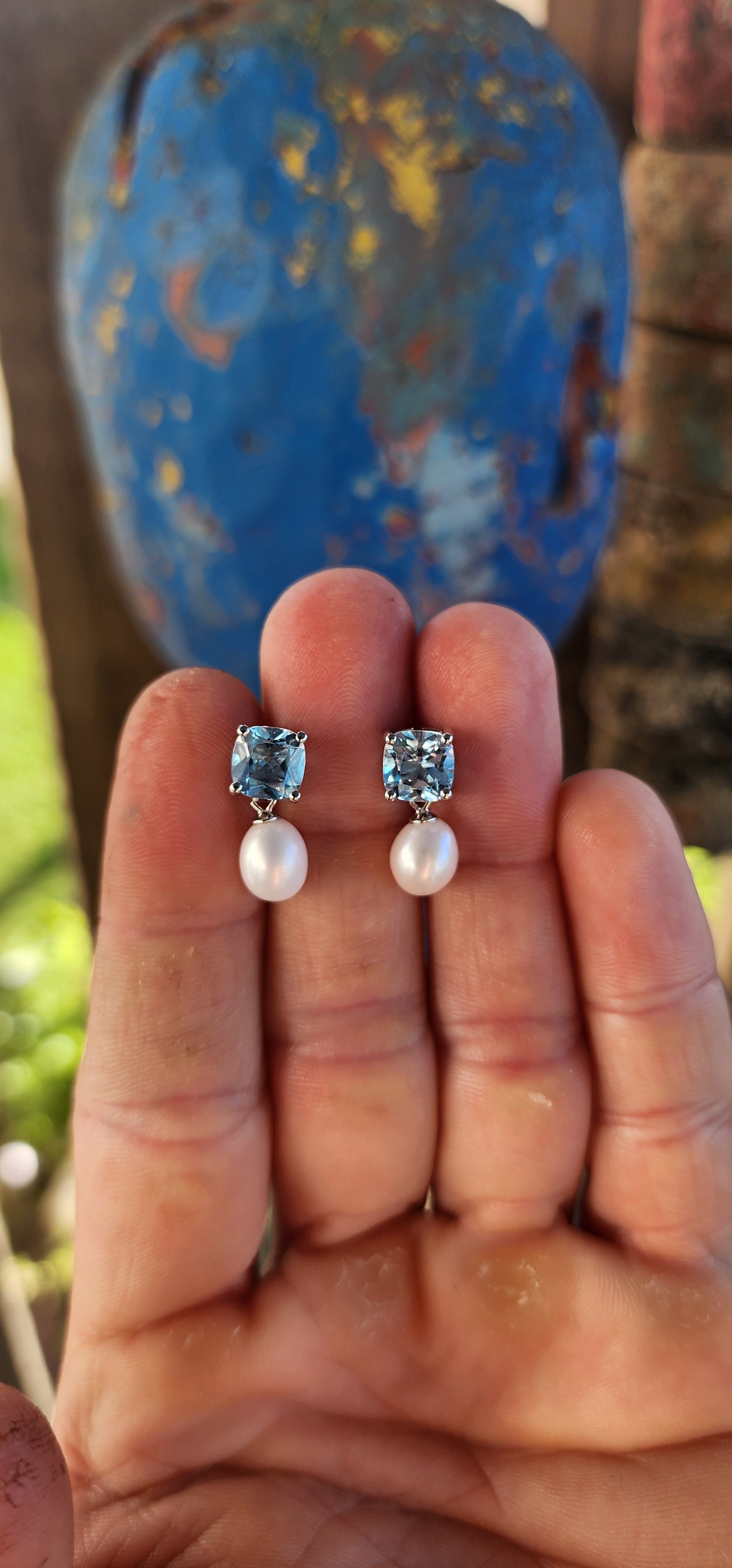 Elegant Sterling Silver Push-In Drop Earrings with Cushion-Cut Sky Blue Topaz and Cultured Pearl Drops.