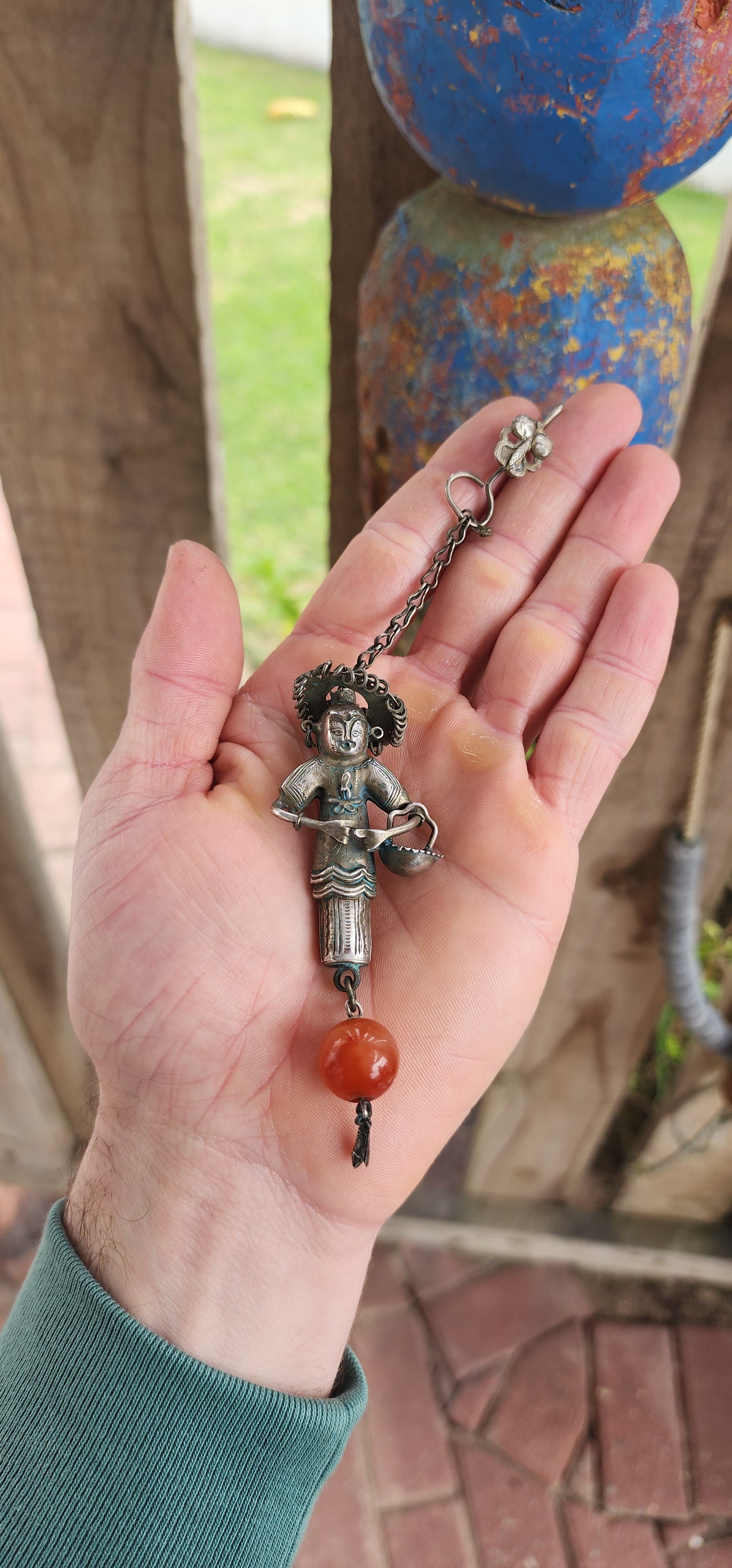Marvelous antique Chinese Qing Dynasty (1644–1911) chatelaine sewing needle case, exquisitely handcrafted in low-grade silver. This piece is both practical and symbolic – a glimpse into the artistry of everyday life in old China.