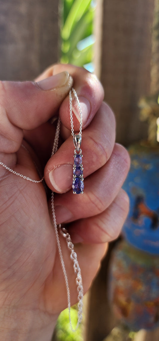 Tanzanite Trifecta Pendant – A Symphony of Lavender Fire.