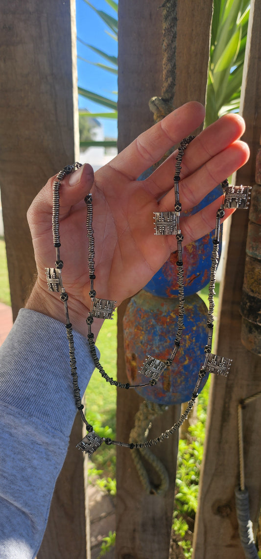 A marvelous and authentic piece of ethnic Ethiopian jewelry, this extra-length necklace embodies both adornment and tradition.