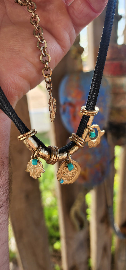 This striking designer costume necklace hails from Danon, one of Israel’s most beloved jewelry houses known for blending ancient symbolism with modern bohemian style.