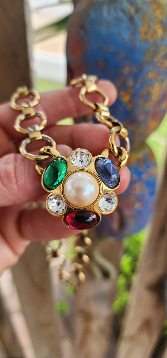 Vintage circa 1960s chunky designer costume necklace by Monet, the American jewelry house celebrated for its luxurious gold-plated finishes and mid-century glamour.