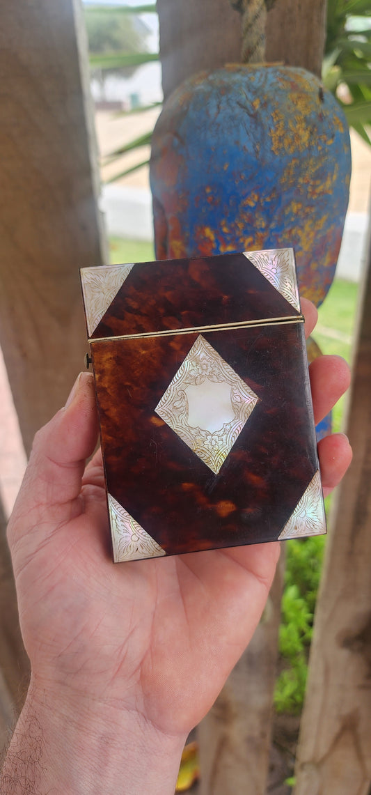 A truly magnificent Antique Victorian late 19th-century calling (visiting) card case, exquisitely hand-crafted from rich, dark blonde tortoiseshell and adorned with luxurious mother-of-pearl inlays.