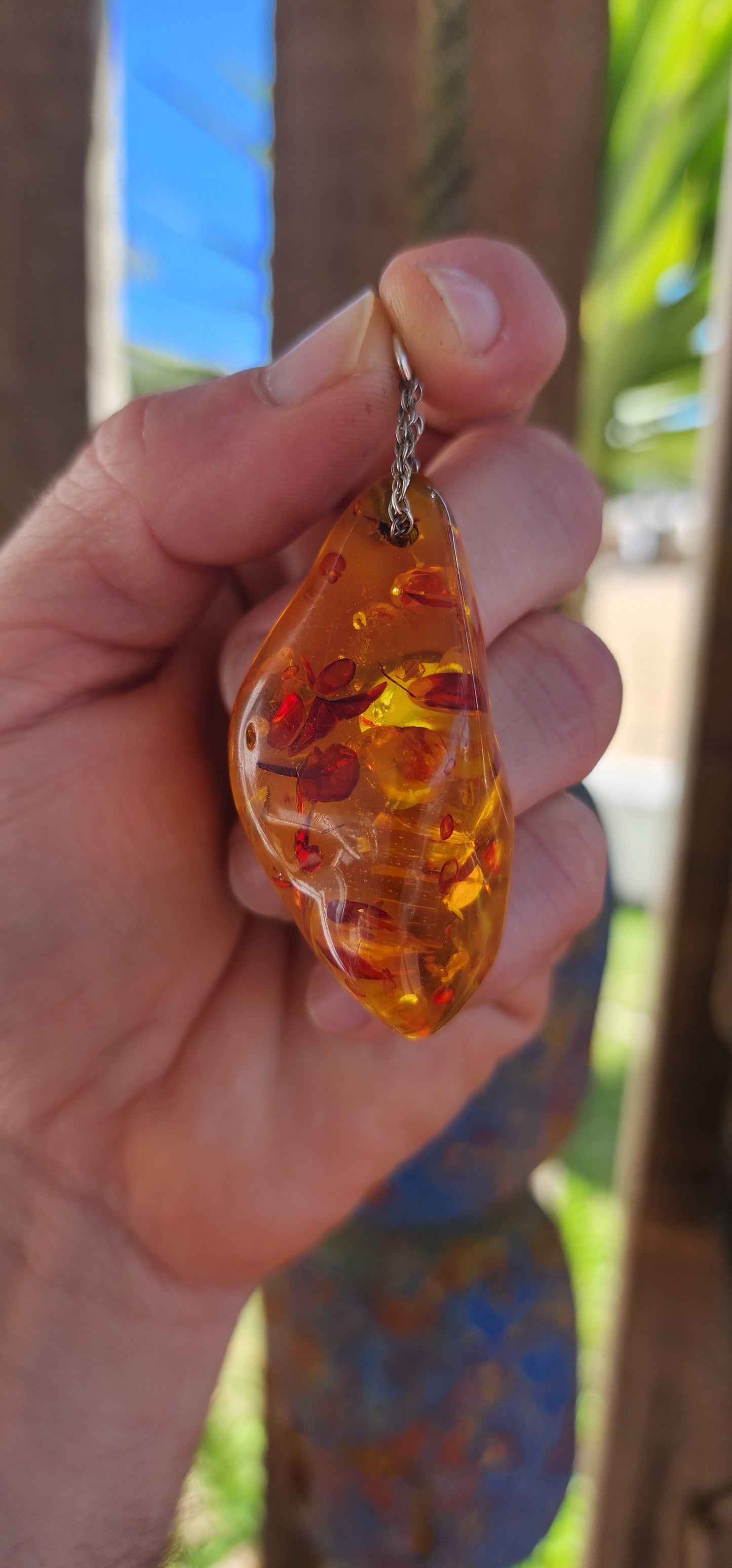 Magnificent and luminous, this large Baltic “piebald” amber pendant glows like captured sunlight!