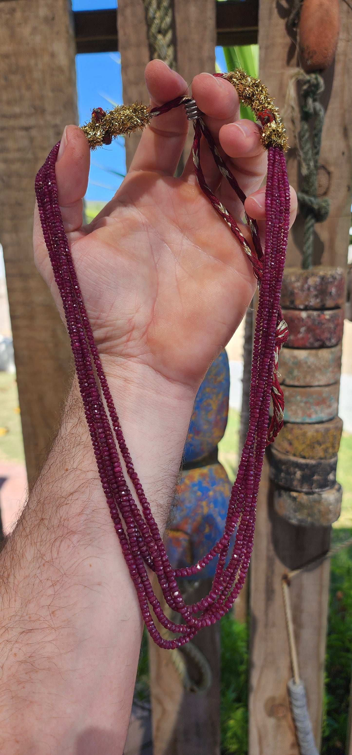 A true Expedition with Jones treasure! Up for grabs is this absolutely stunning vintage Indian five-strand Sarafa ruby gemstone necklace — a masterpiece of traditional craftsmanship and opulent gemstone beauty.