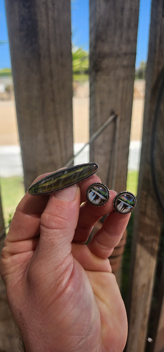 A breathtakingly rare Art Deco sterling silver jewelry set by the renowned English silversmith Thomas L. Mott (T.L.M.), dating to the 1920s–1930s, and featuring real Morpho butterfly wings.