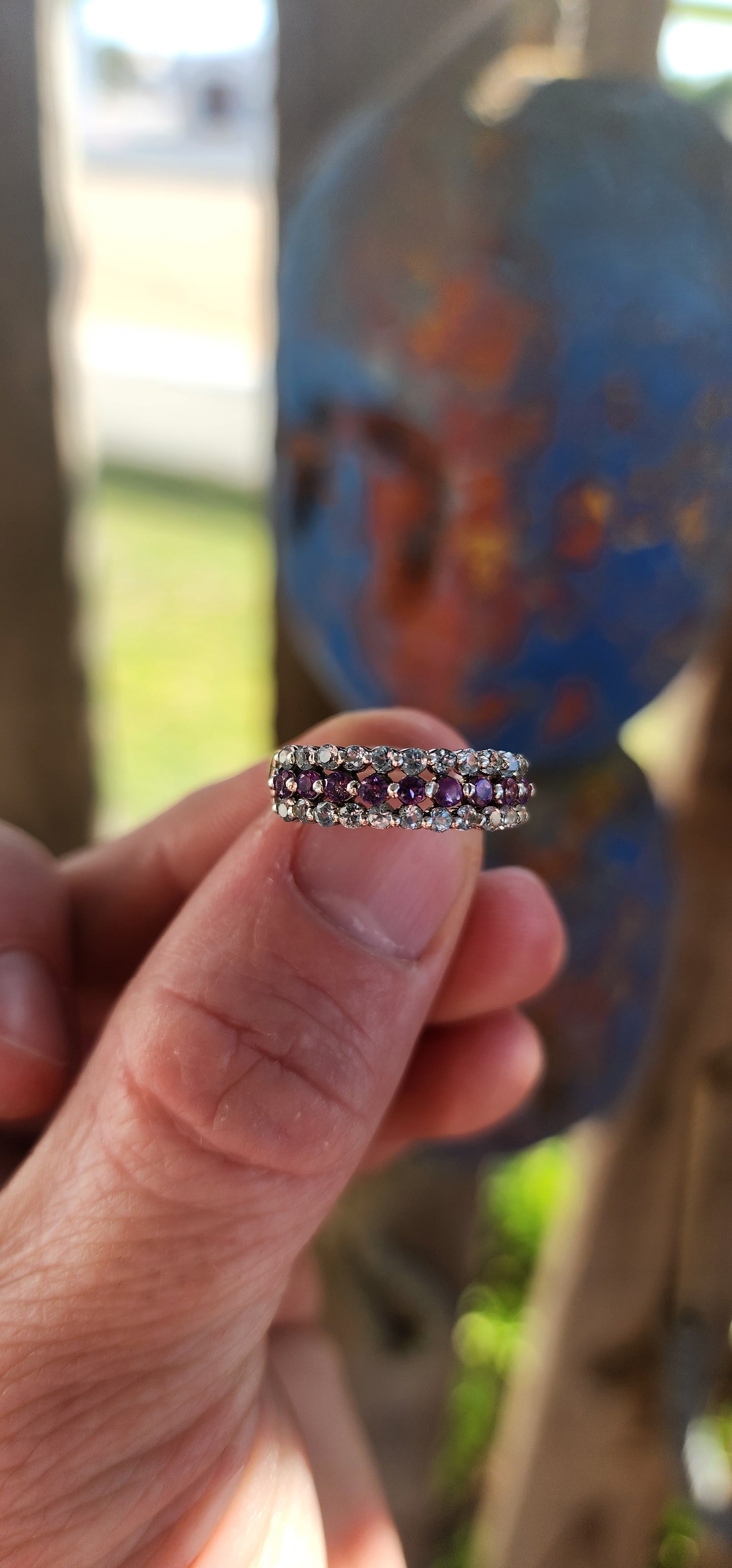 A beautifully balanced sterling silver 3-row half-eternity ring.