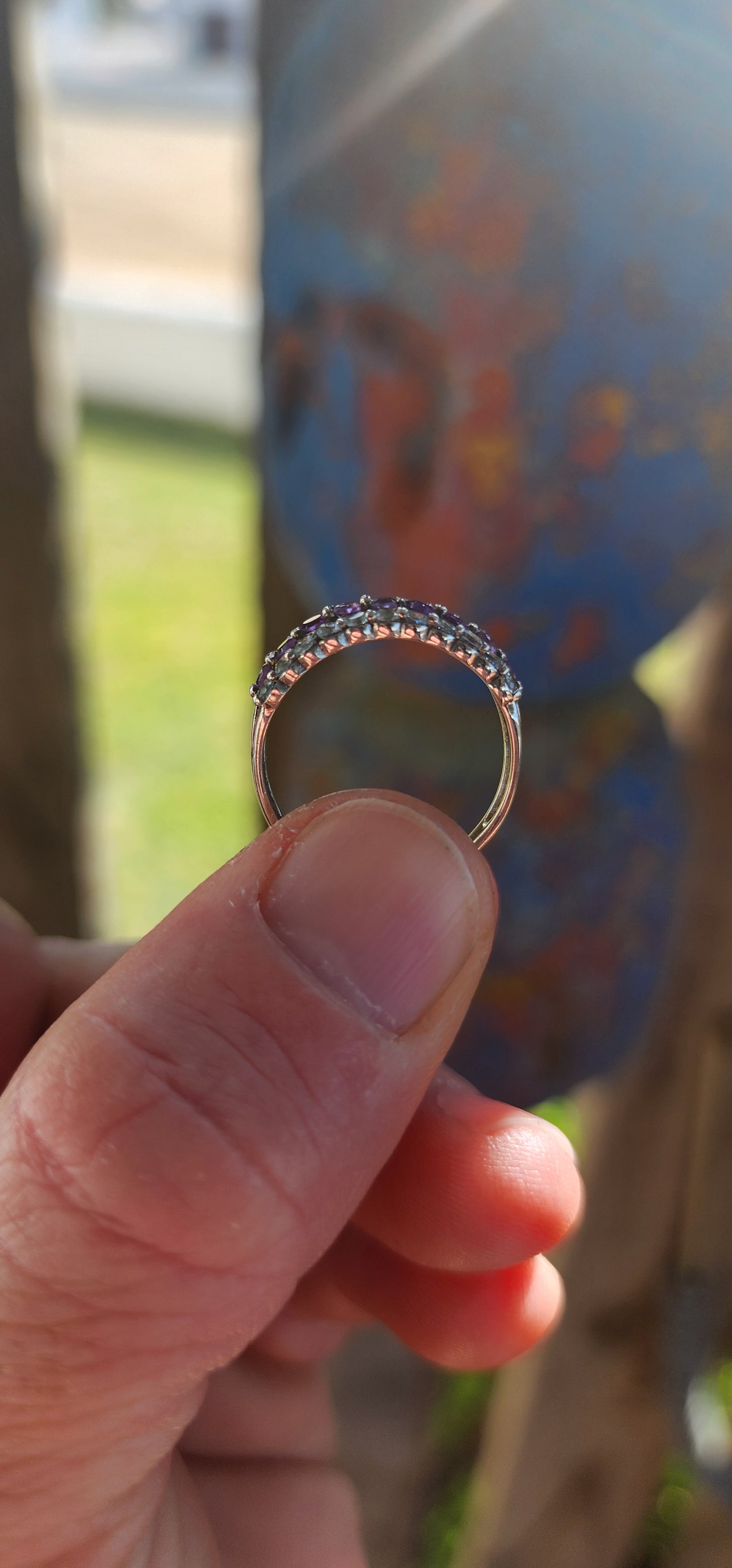 A beautifully balanced sterling silver 3-row half-eternity ring.