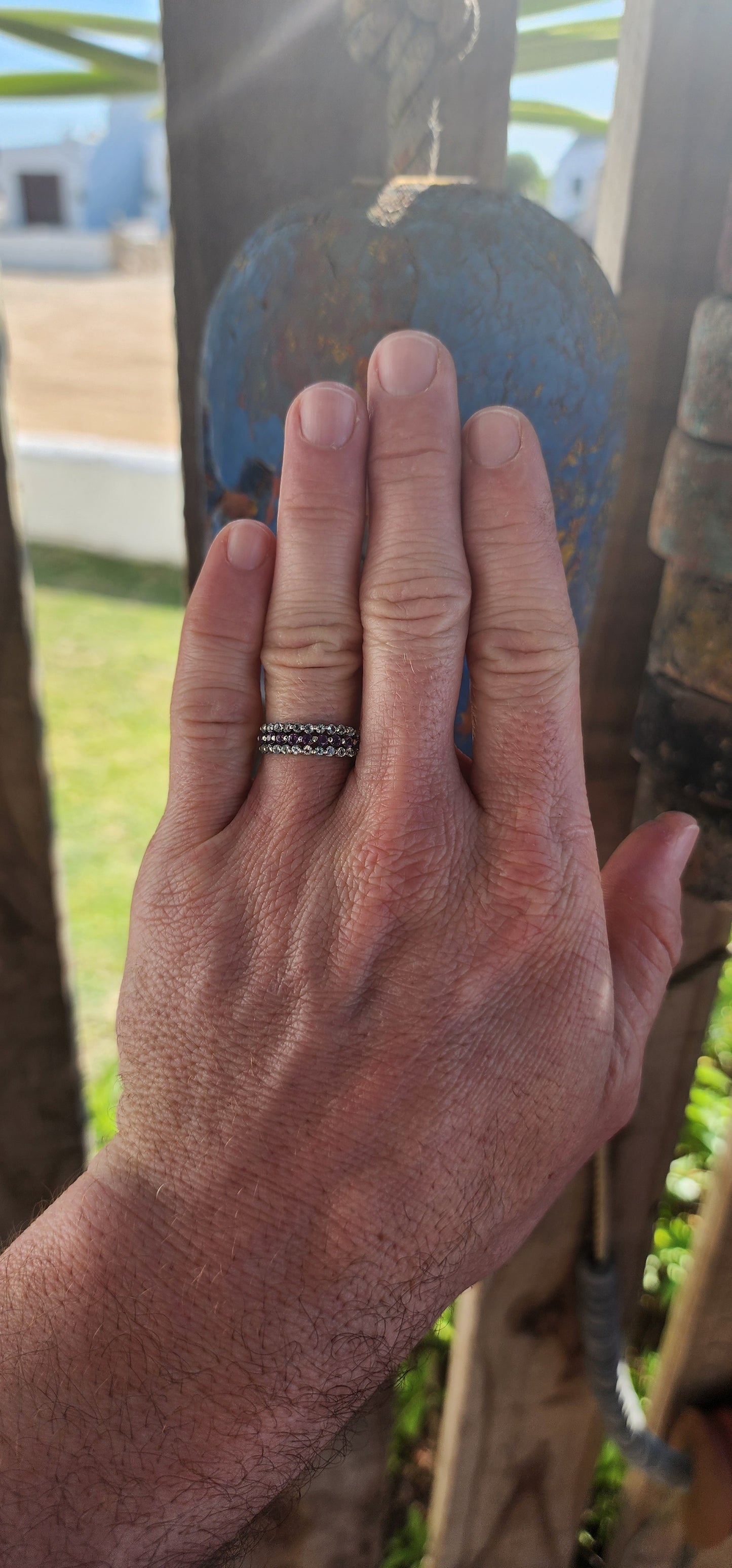 A beautifully balanced sterling silver 3-row half-eternity ring.