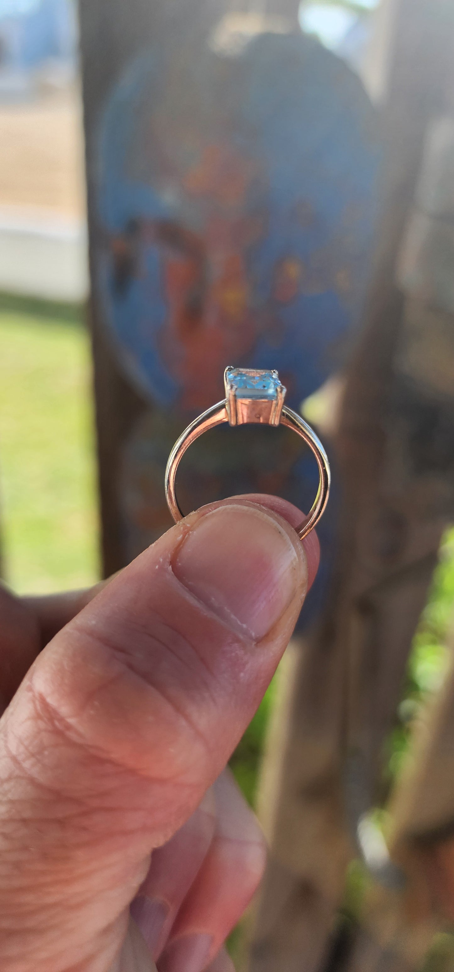 Beautifully crafted sterling silver solitaire ring.
At its heart lies a captivating emerald-cut sky blue topaz, held securely in a four-prong raised basket.
