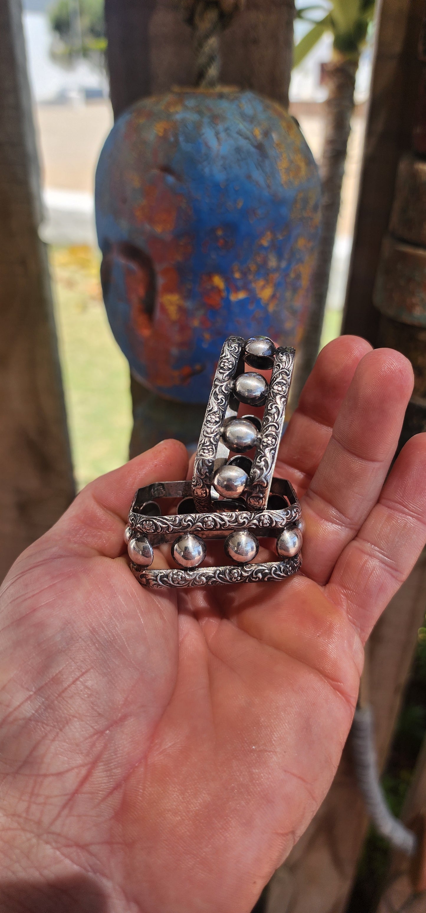 A beautifully matched pair of vintage sterling silver napkin rings by the highly sought-after South African silversmith Joe Calafato, working under his renowned studio name Candida.