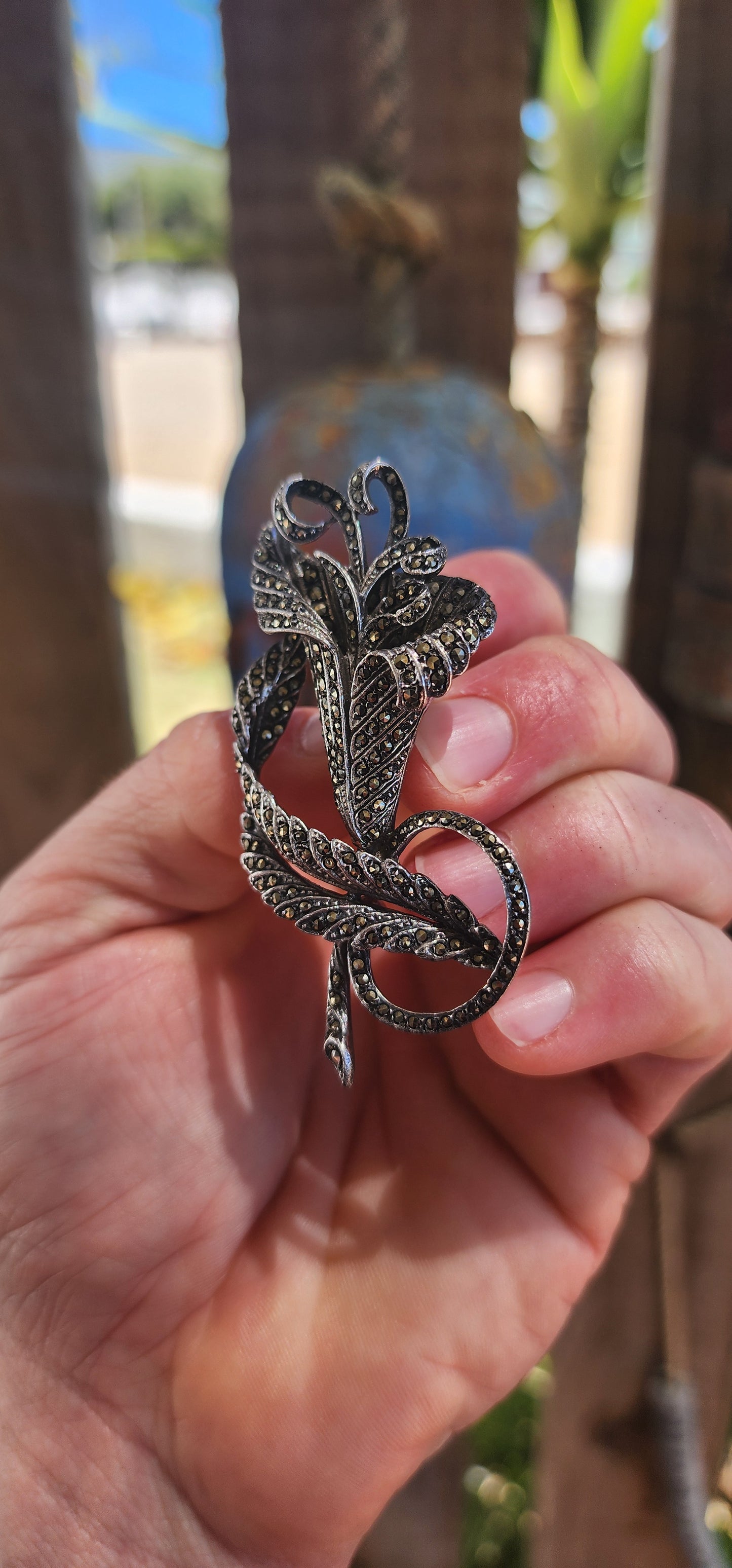 A truly captivating Art Deco-era treasure, this large, sculptural floral brooch dates to the 1930s and is crafted in solid sterling silver, beautifully rhodium-plated to preserve its brilliance.