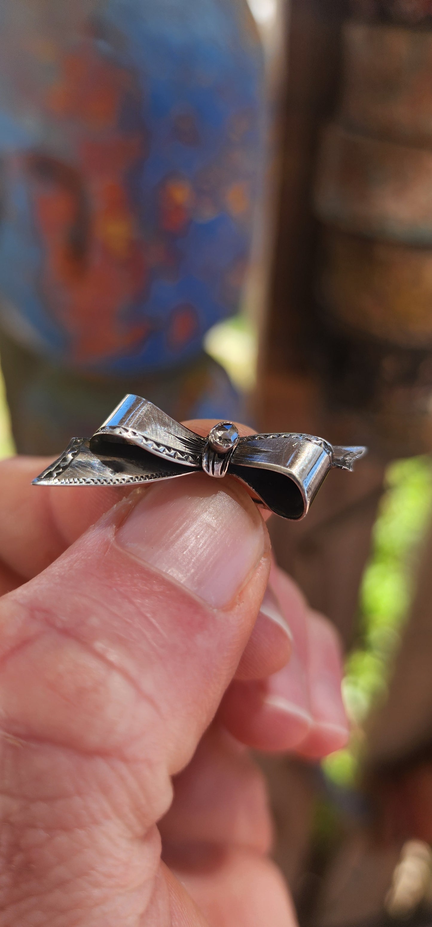 Vintage Sterling Silver Bow Brooch with Rose-Cut Diamond – A Symbol of Eternal Devotion.