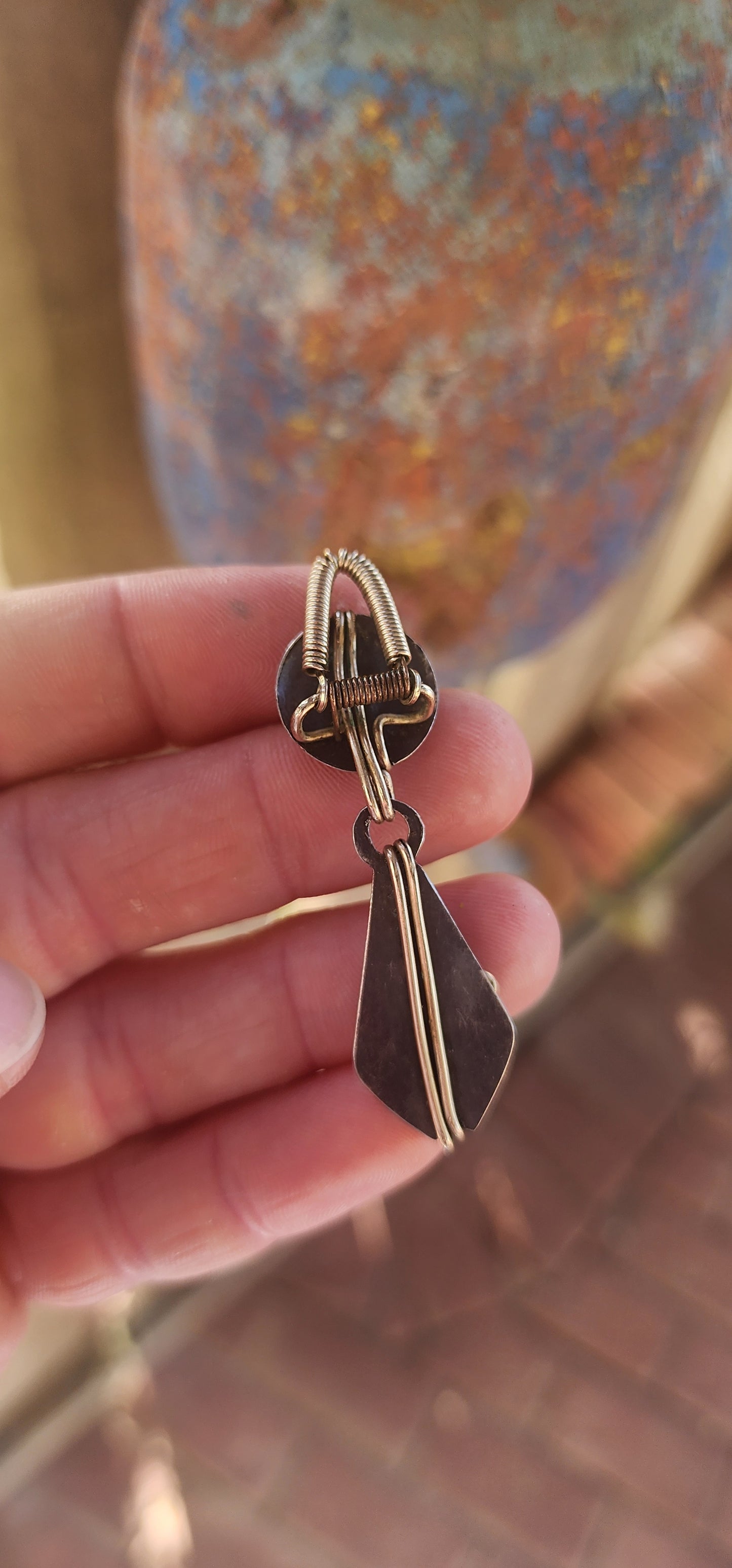 A spectacular Arts & Crafts era treasure (c. 1900s) — this generous, hand-wrought pair of clip-on drop earrings perfectly captures the raw spirit and bold design language of early artisan metalwork.