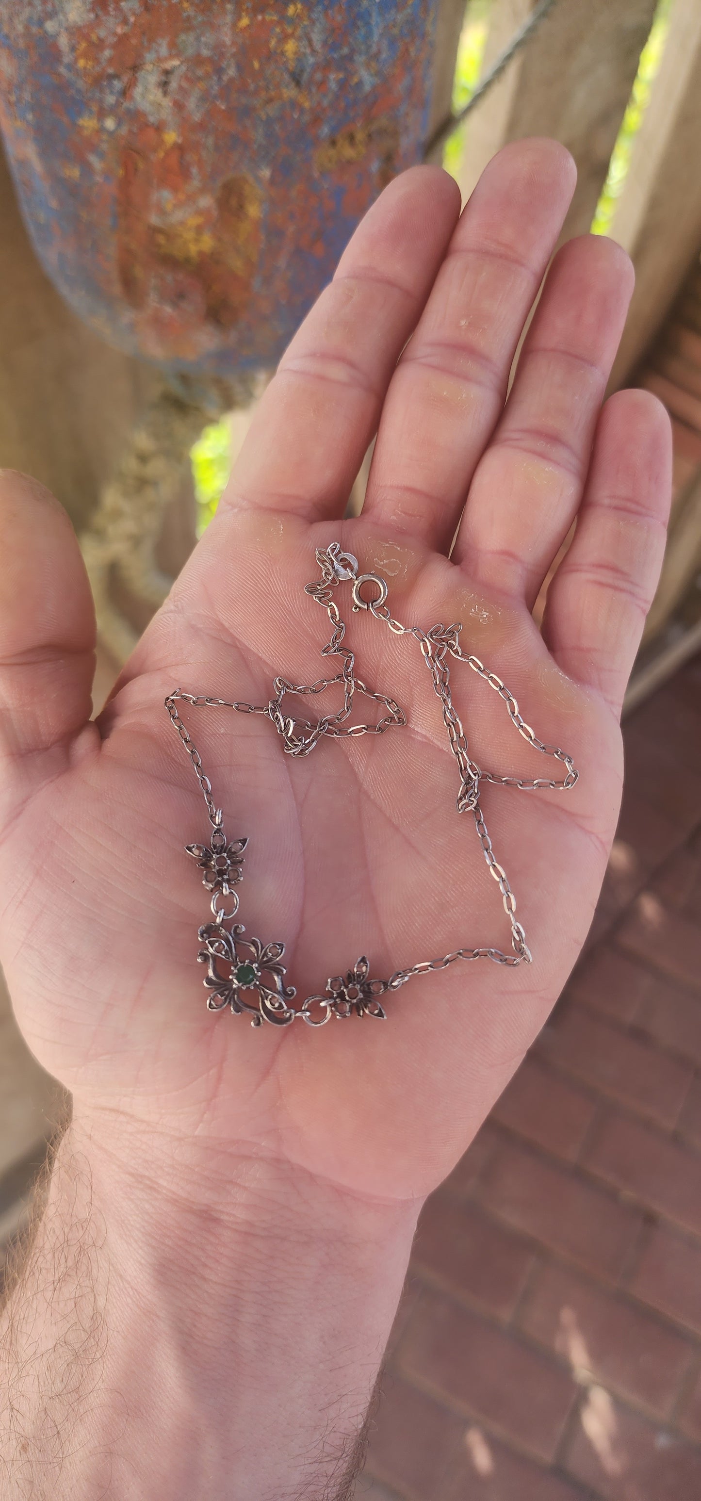 This antique sterling-silver treasure is a poem wrought in metal — petite, elegant, and spellbound with Gothic romance.