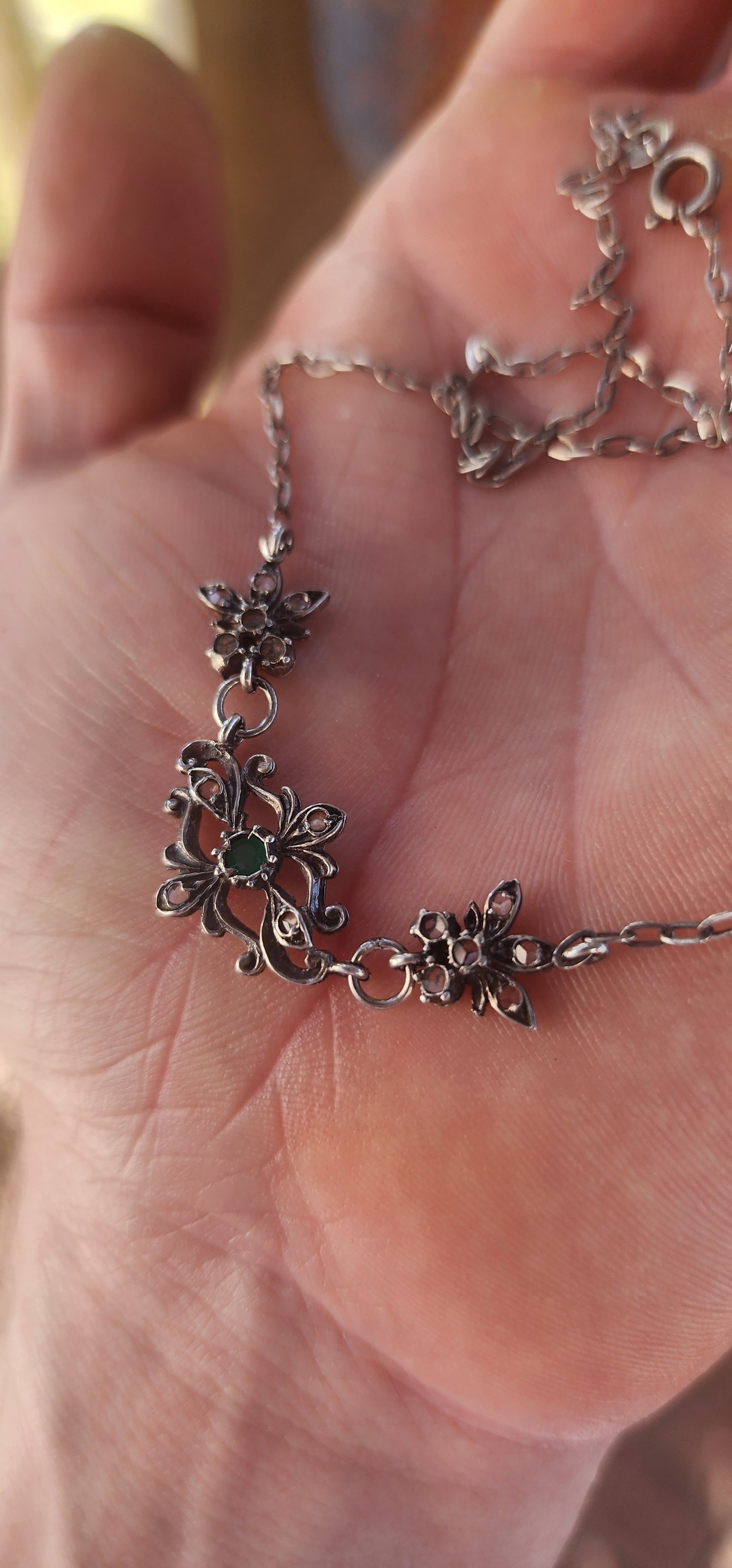 This antique sterling-silver treasure is a poem wrought in metal — petite, elegant, and spellbound with Gothic romance.