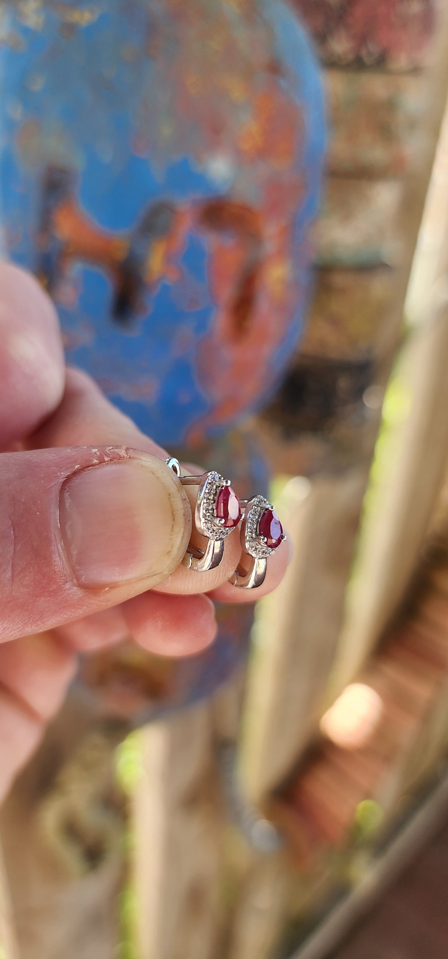 Delicately crafted in glowing sterling silver, these earrings embody sophistication in a compact yet captivating design.