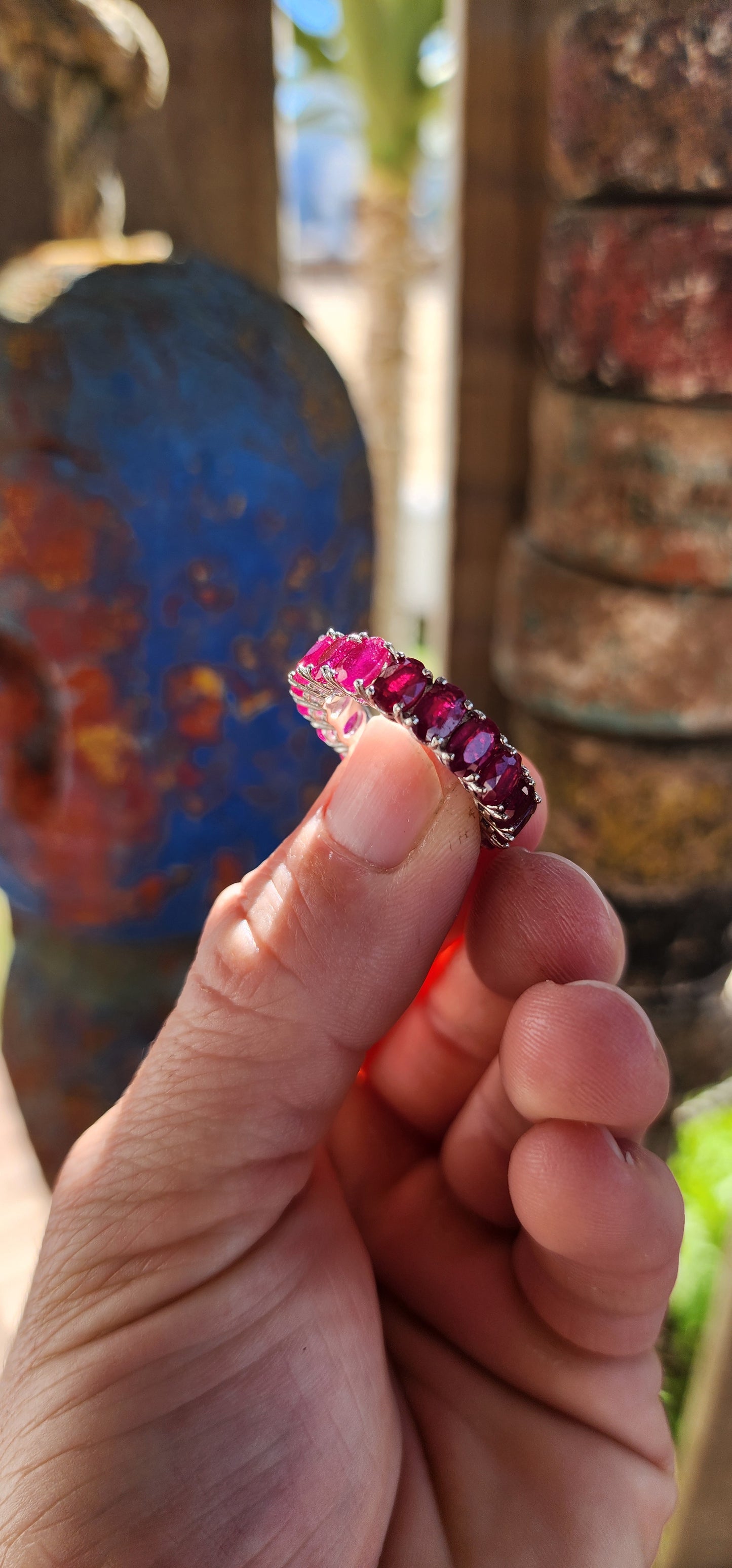 This mesmerising full-eternity beauty is a never-ending ribbon of romance, showcasing 18 glowing oval-cut rubies in a seamless band of fire and colour.