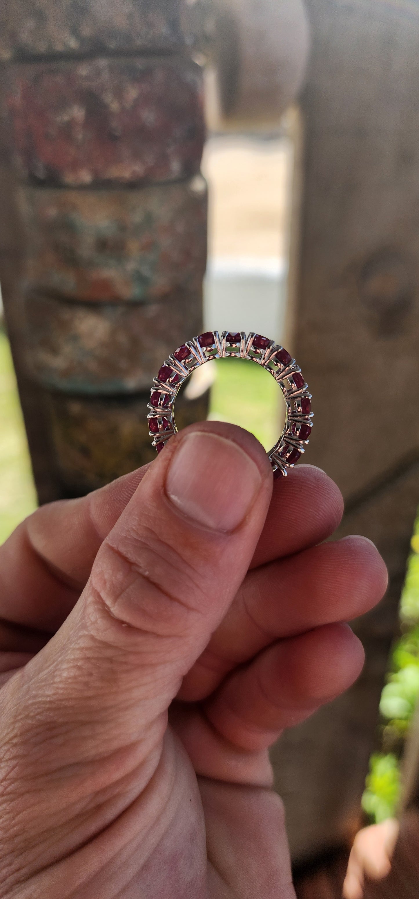 This mesmerising full-eternity beauty is a never-ending ribbon of romance, showcasing 18 glowing oval-cut rubies in a seamless band of fire and colour.