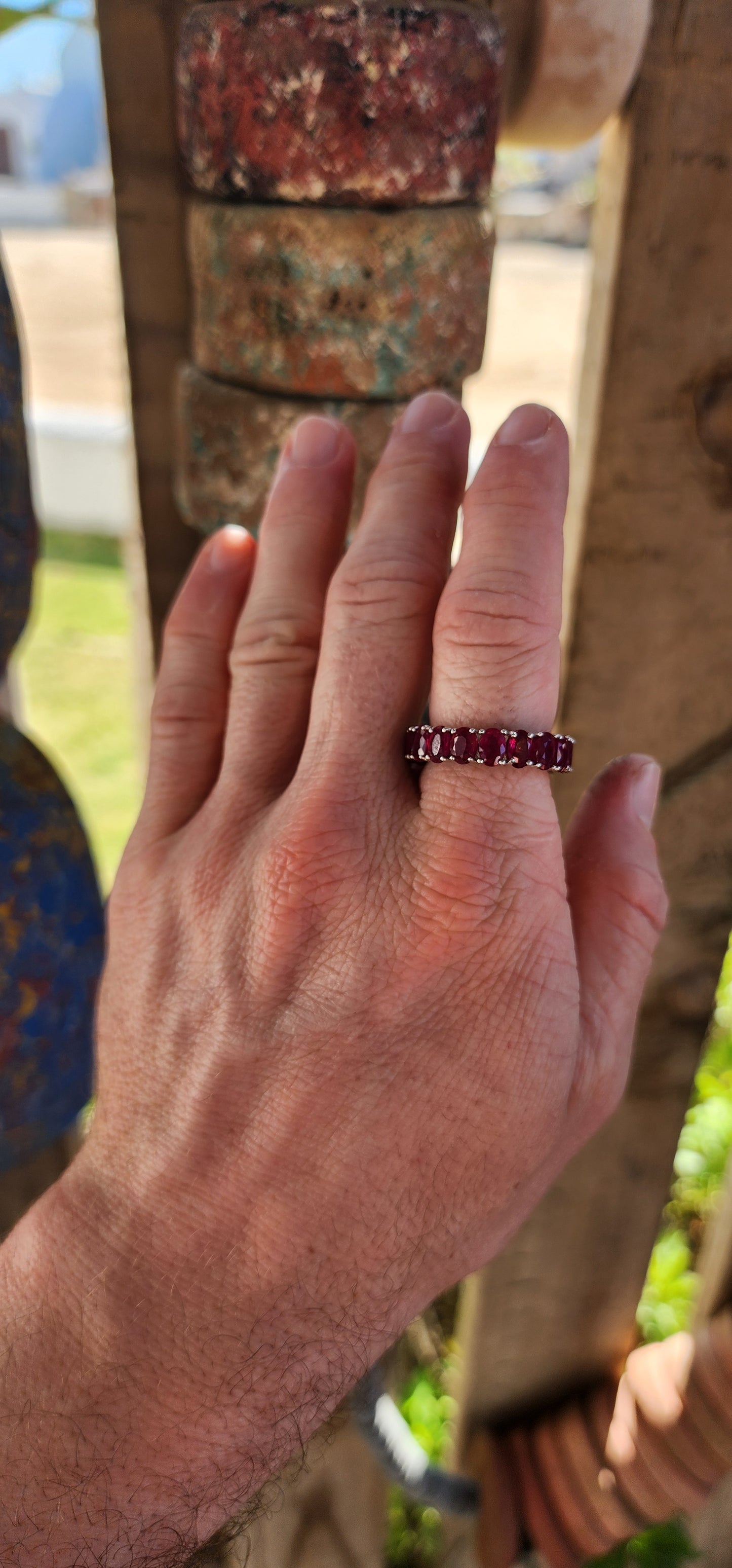This mesmerising full-eternity beauty is a never-ending ribbon of romance, showcasing 18 glowing oval-cut rubies in a seamless band of fire and colour.