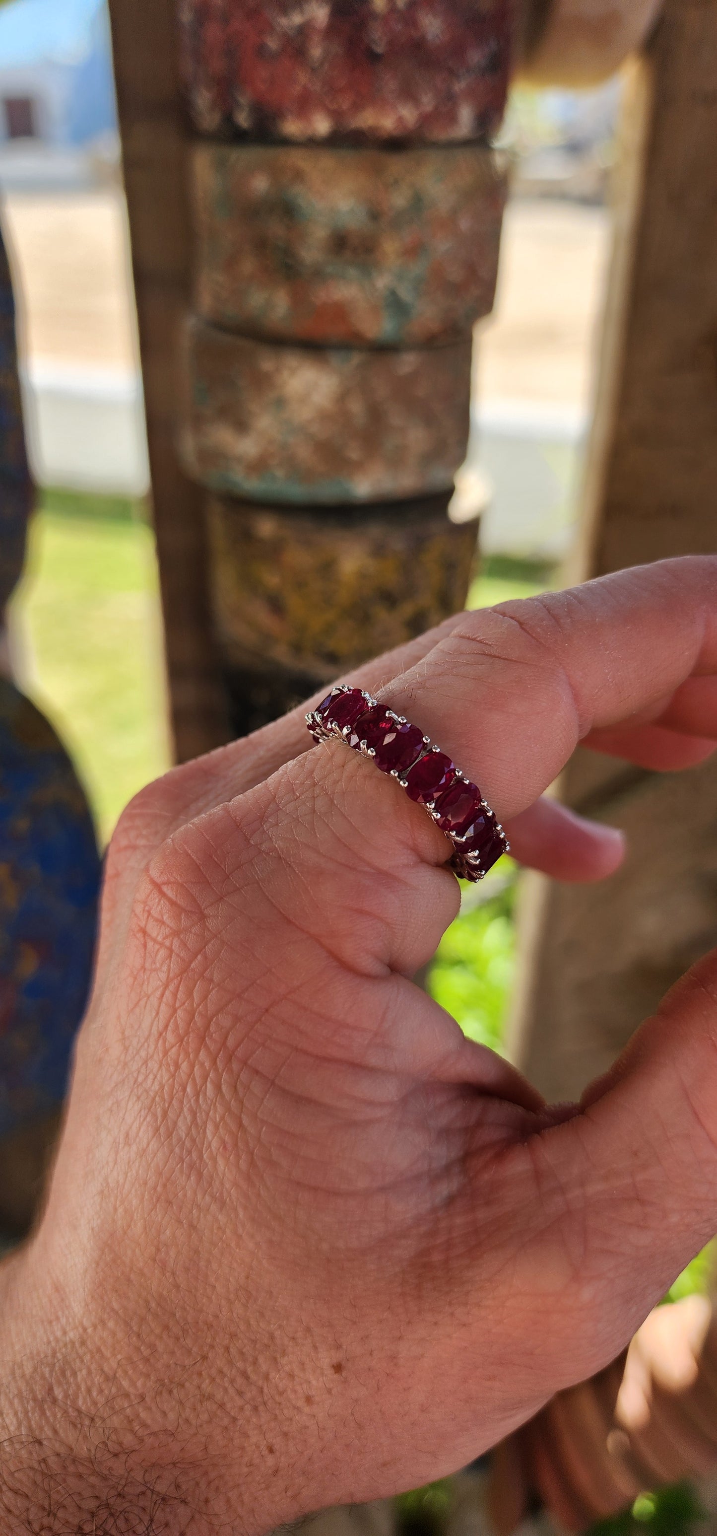 This mesmerising full-eternity beauty is a never-ending ribbon of romance, showcasing 18 glowing oval-cut rubies in a seamless band of fire and colour.