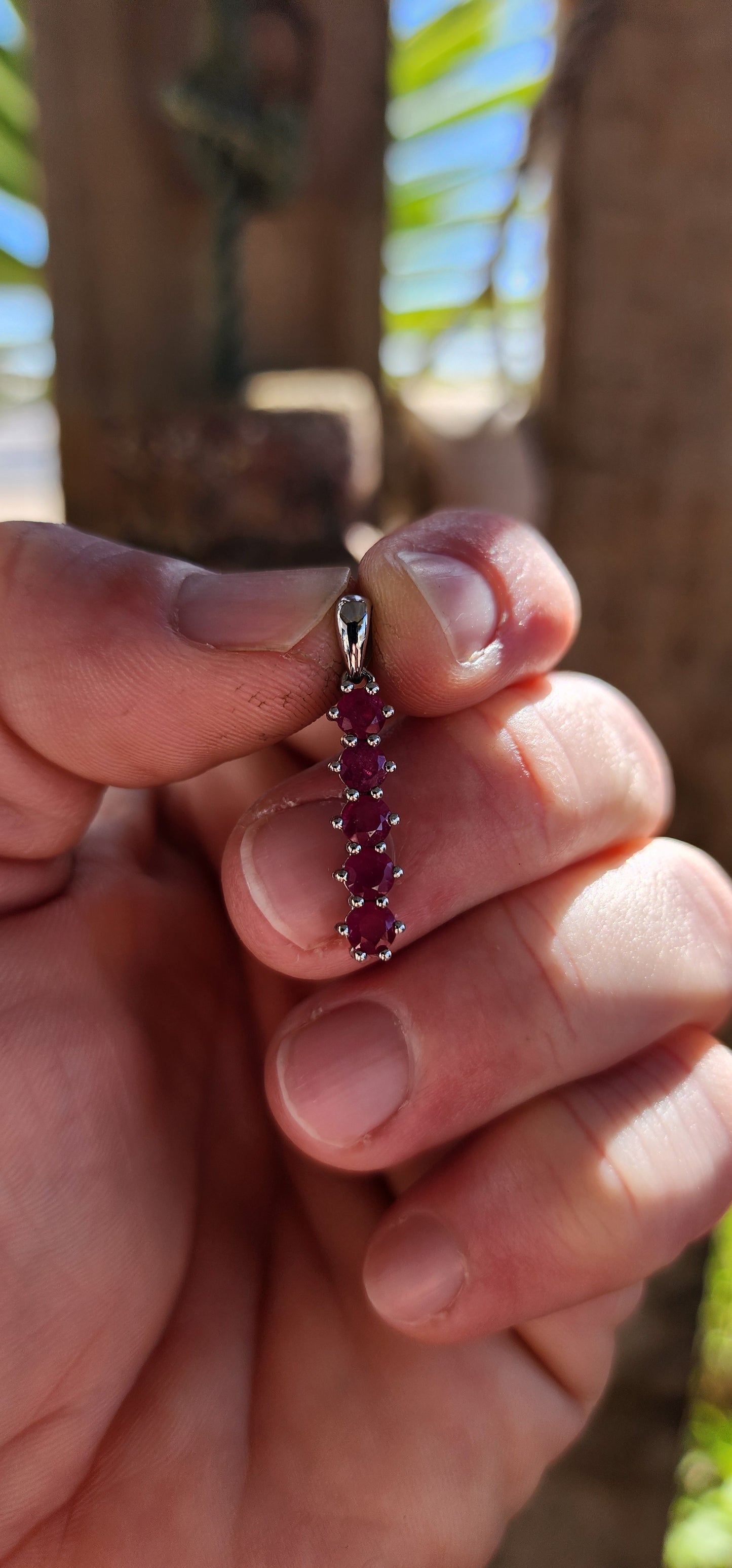 Sterling Silver and Ruby Line Pendant.