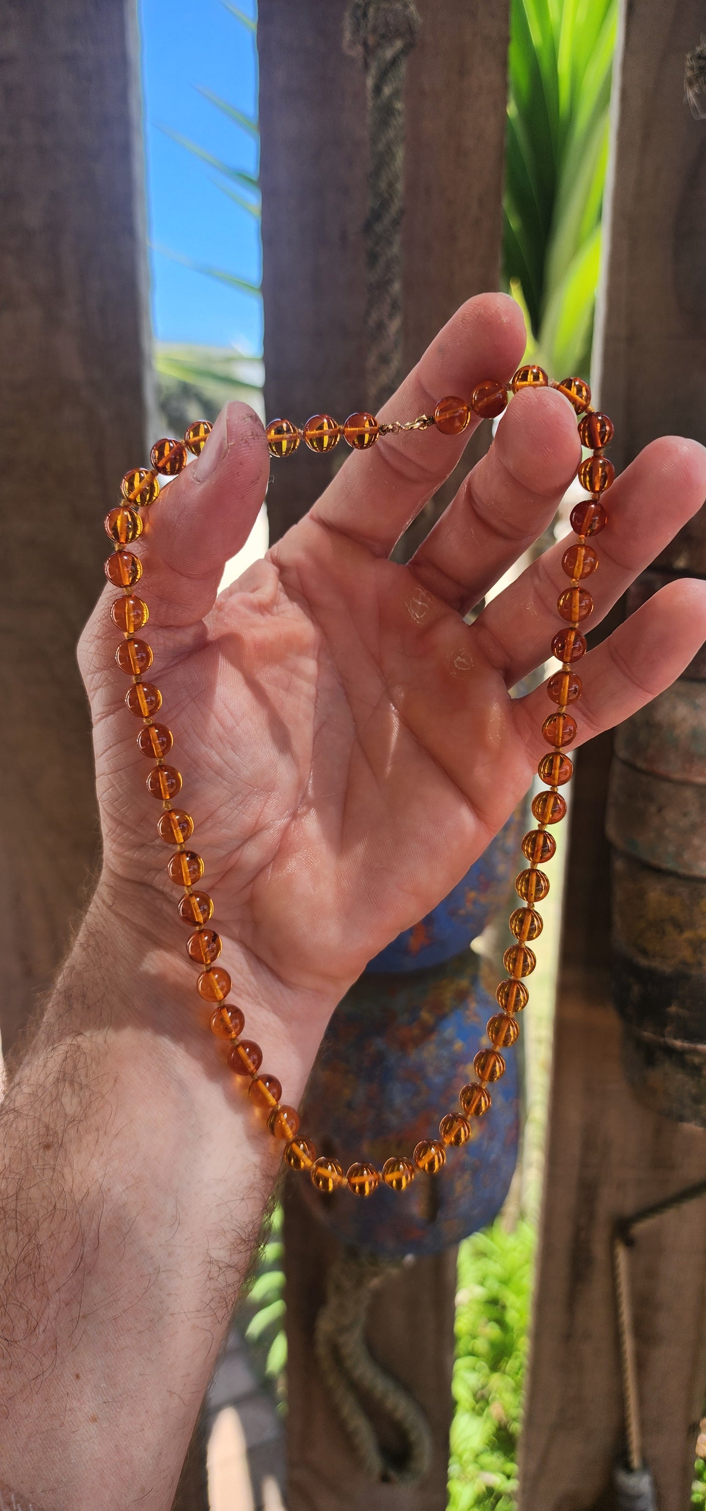 A warm sun-kissed treasure, this beautiful vintage cognac Baltic amber necklace radiates honey-rich glow and natural charm.